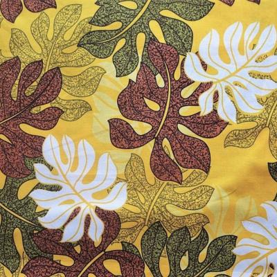 Tissu coton jaune et marron, grandes feuilles de monsteras