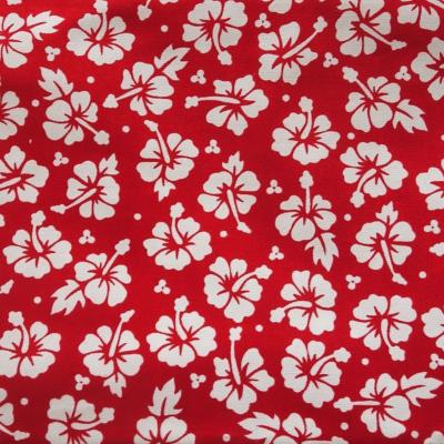 Tissu rouge et petits hibiscus blancs 50 X 110 cm