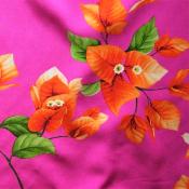 Tissu fibranne rose et fleurs de bougainvilliers oranges - Largeur 150 cm